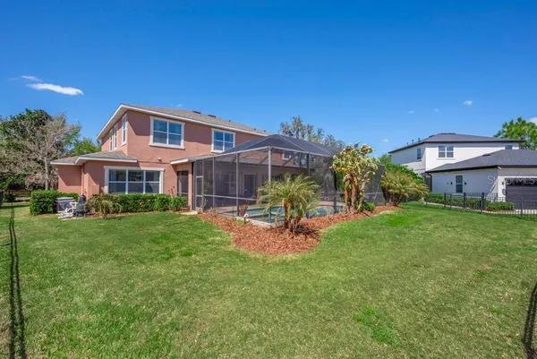 an aerial view of a houses with outdoor space and street view