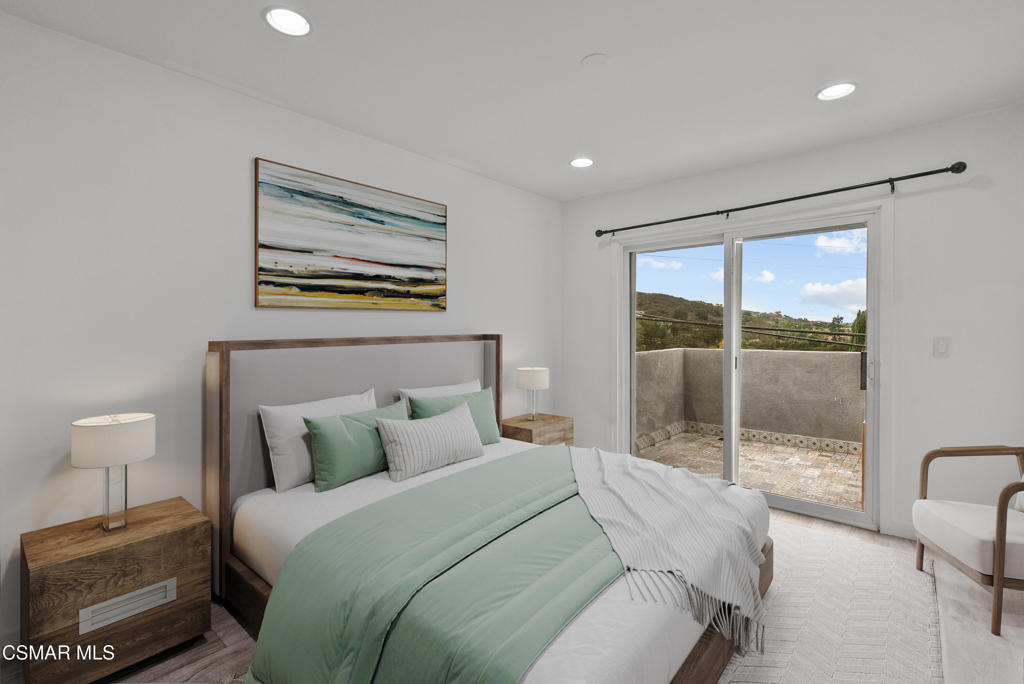 264 Beech Road Newbury Park, CA 91320 - Photo 15 of 29 a bedroom with a large bed and a large window