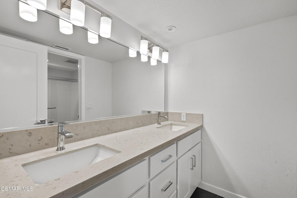 264 Beech Road Newbury Park, CA 91320 - Photo 17 of 29 a bathroom with a sink and a mirror