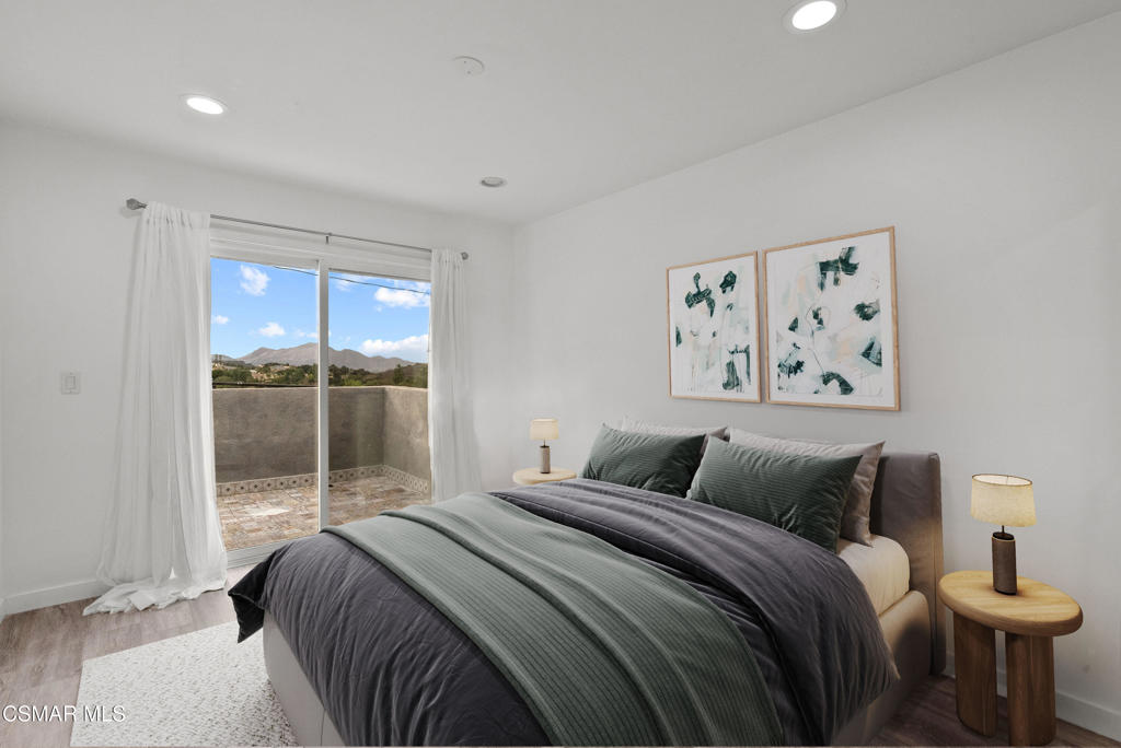 264 Beech Road Newbury Park, CA 91320 - Photo 19 of 29 a bedroom with a large bed and a window