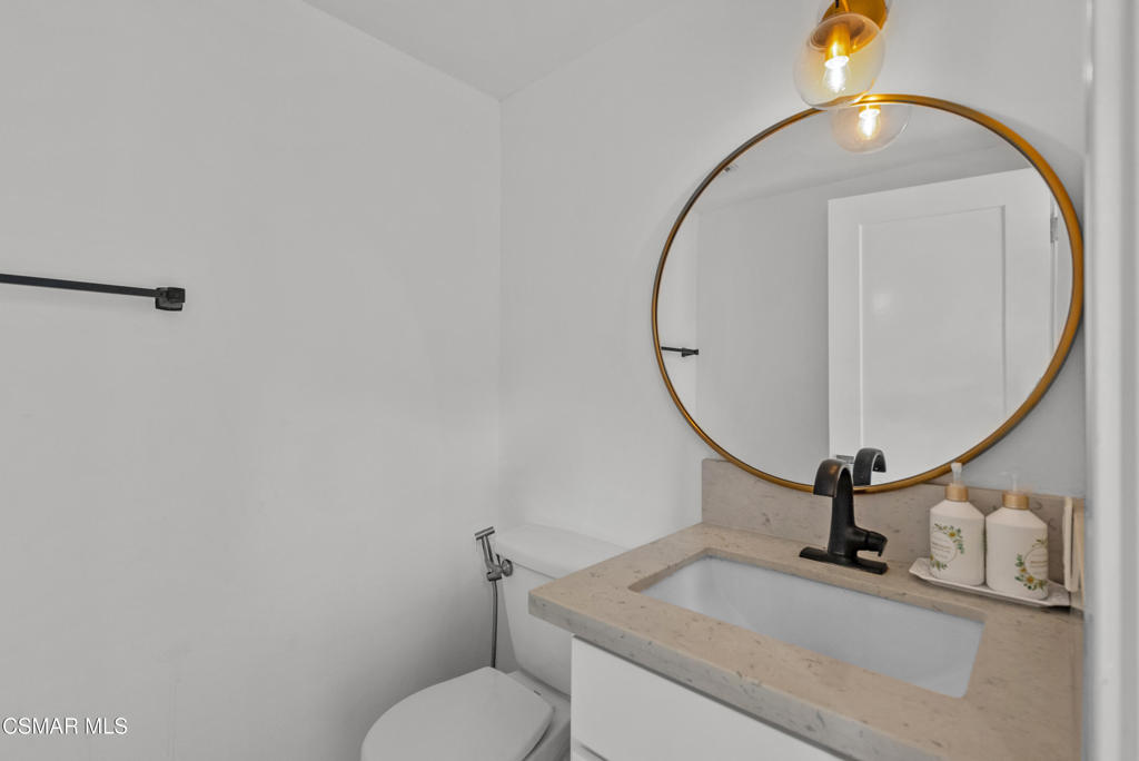 264 Beech Road Newbury Park, CA 91320 - Photo 20 of 29 a bathroom with a sink and mirror