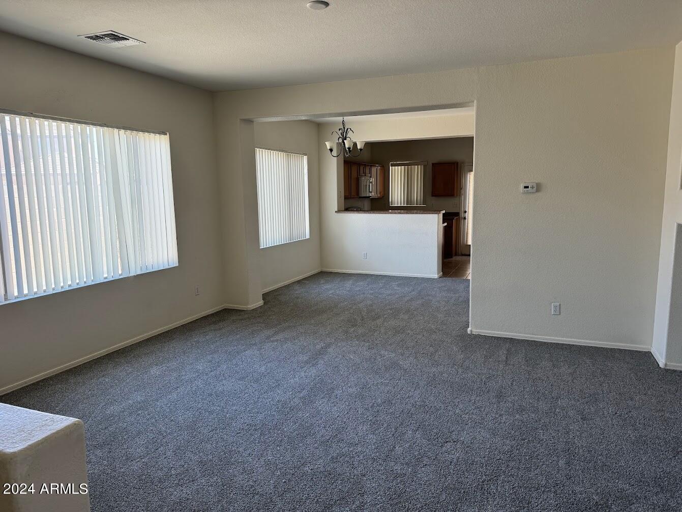 9401 West Berkeley Road Phoenix, AZ 85037 - Photo 9 of 27 a view of empty room with window