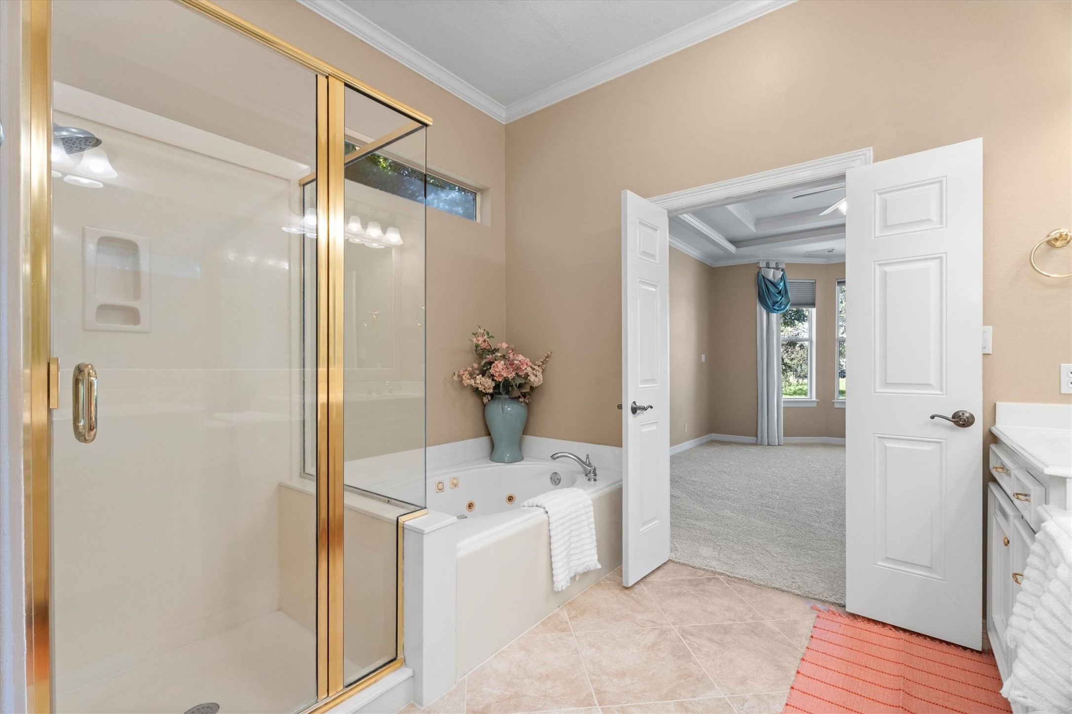 31627 Cedardale Street Magnolia, TX 77355 - Photo 28 of 47 Primary bathroom with walk-in shower, and relaxing Jacuzzi tub.