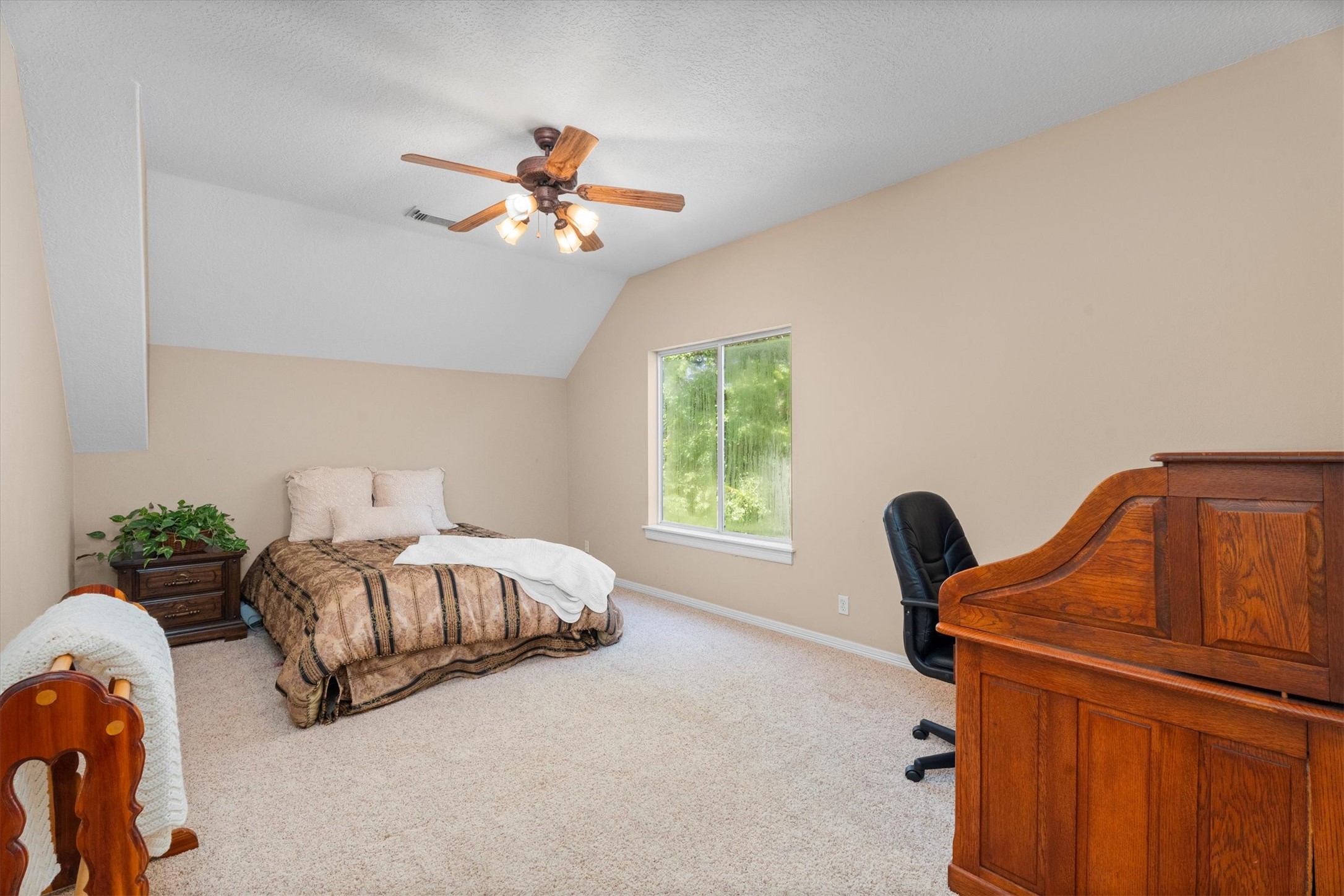 31627 Cedardale Street Magnolia, TX 77355 - Photo 35 of 47 Spacious third bedroom with closet storage, offering privacy away from the main living areas.