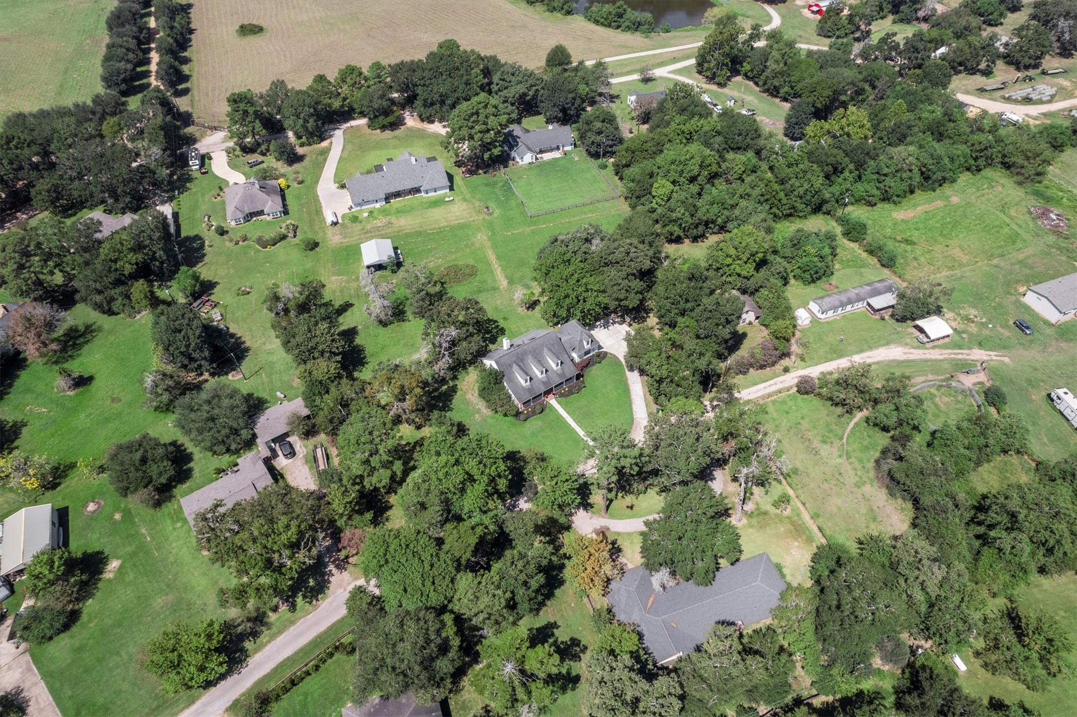 31627 Cedardale Street Magnolia, TX 77355 - Photo 6 of 47 Shows the generous acreage and layout of the home within a private community setting.