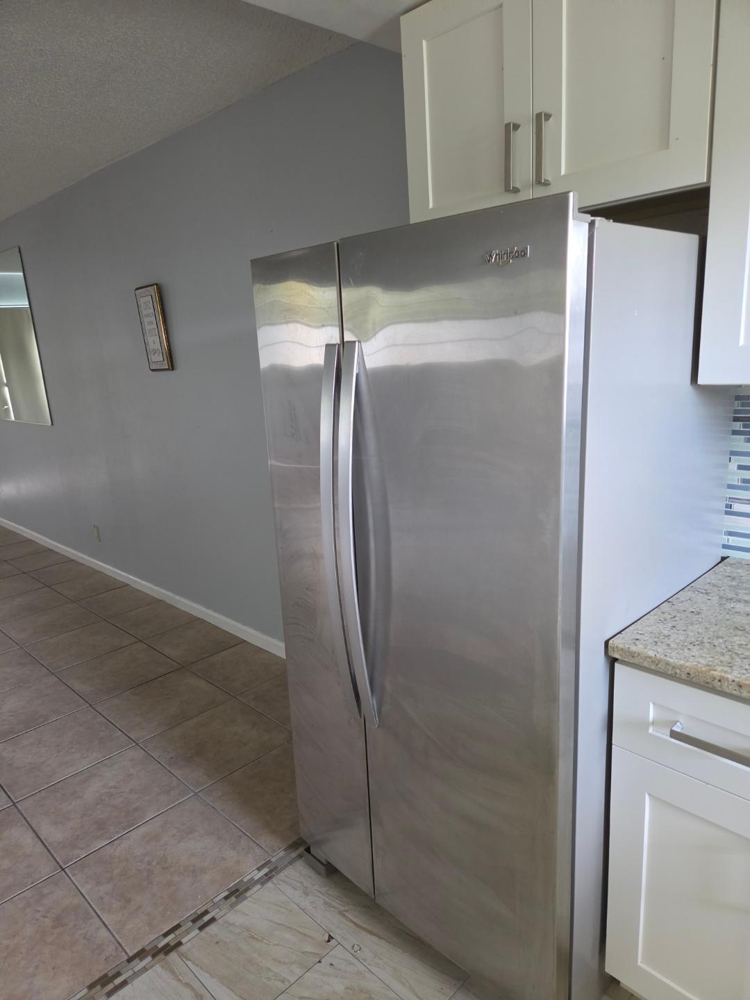 9949 Sandalfoot Boulevard, Unit 512 Boca Raton, FL 33428 - Photo 6 of 8 9949 SANDALFOOT APT 512 FRONT KITCHEN 3