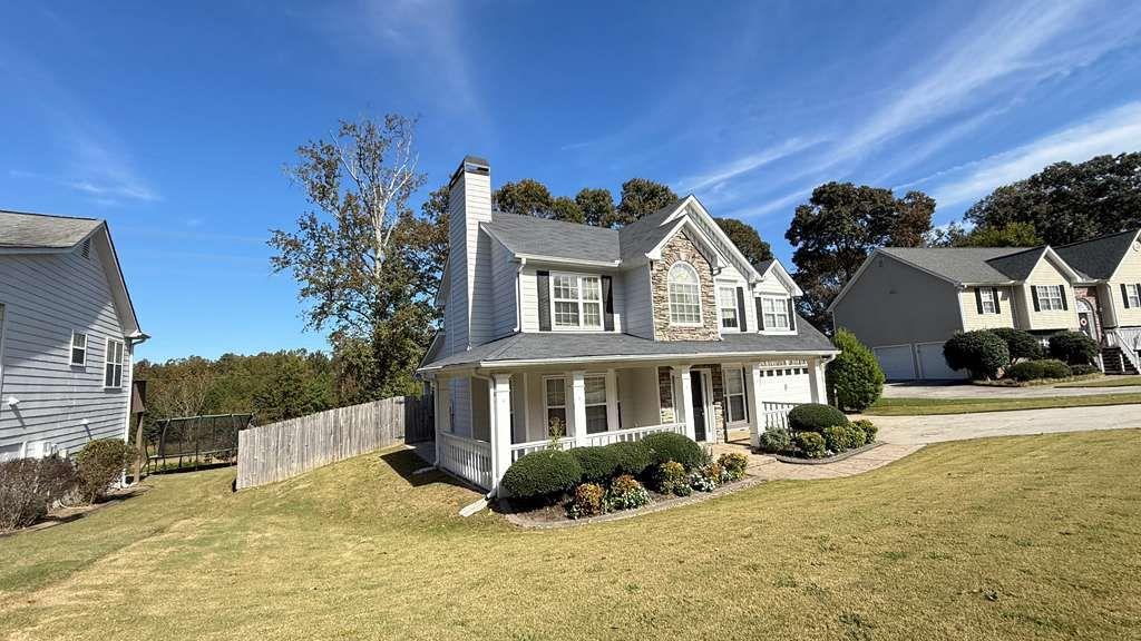 3860 Morgan Road Buford, GA 30519 - Photo 2 of 21 a view of a house with a swimming pool