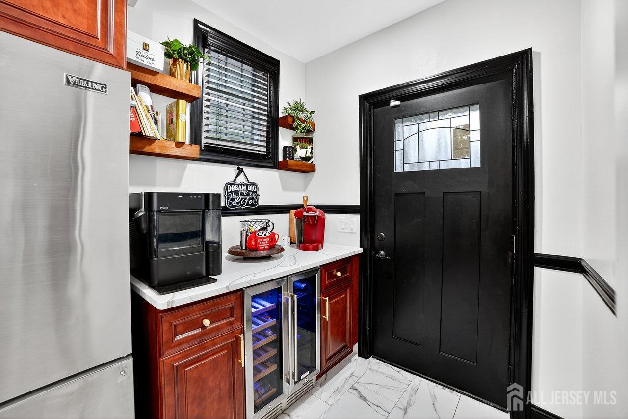 101 West Hill Road Colonia, NJ 07067 - Photo 27 of 52 a hallway with washer and dryer