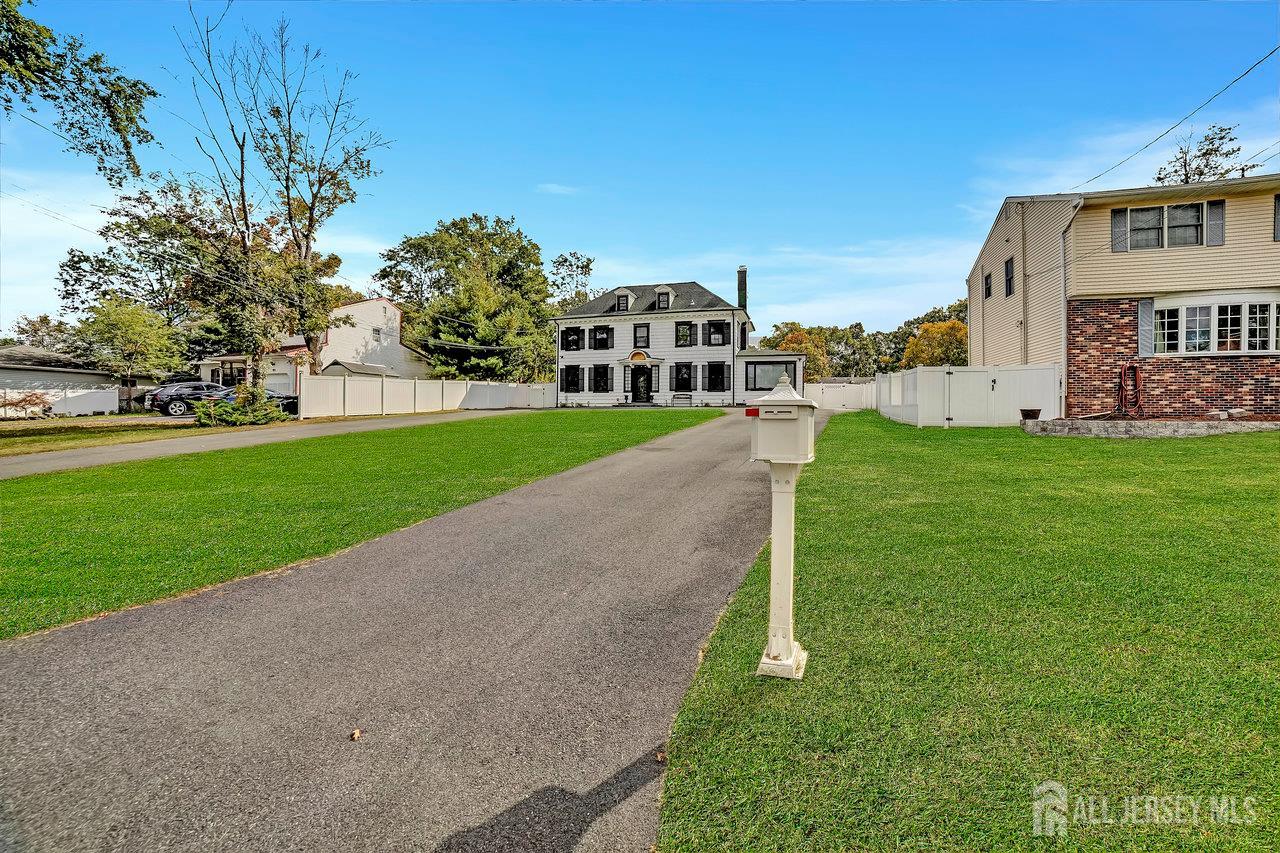 101 West Hill Road Colonia, NJ 07067 - Photo 3 of 52 a view of a house with a big yard