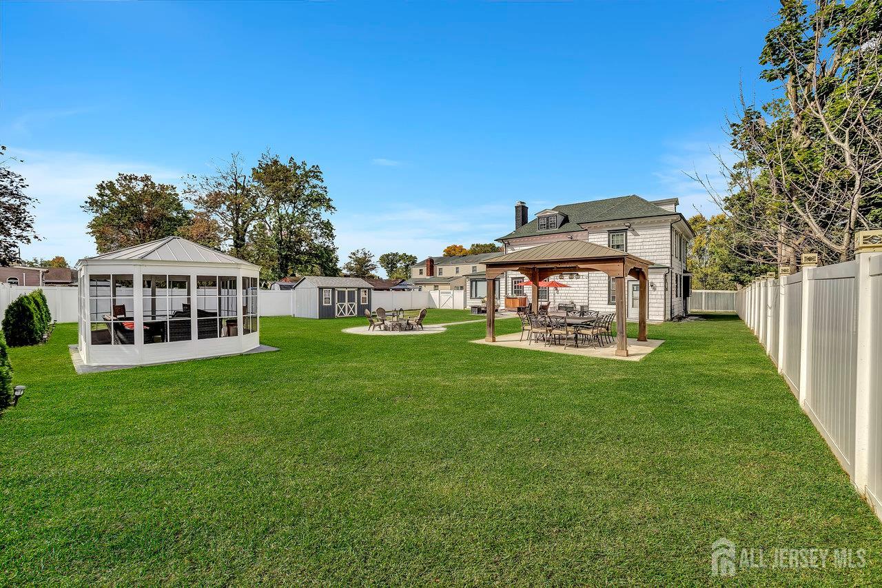 101 West Hill Road Colonia, NJ 07067 - Photo 41 of 52 a view of a house with a yard