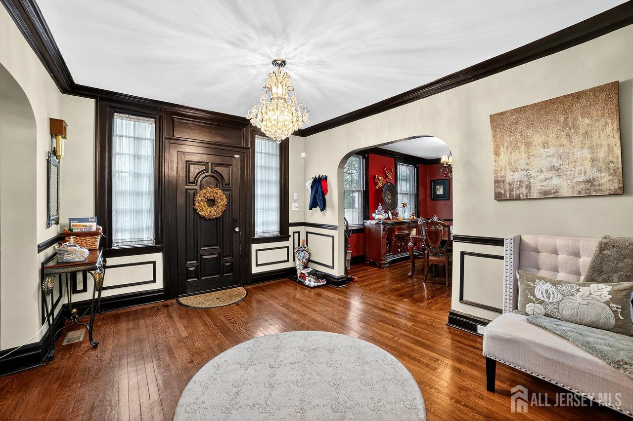 101 West Hill Road Colonia, NJ 07067 - Photo 44 of 52 a view of a livingroom with furniture and a flat screen tv