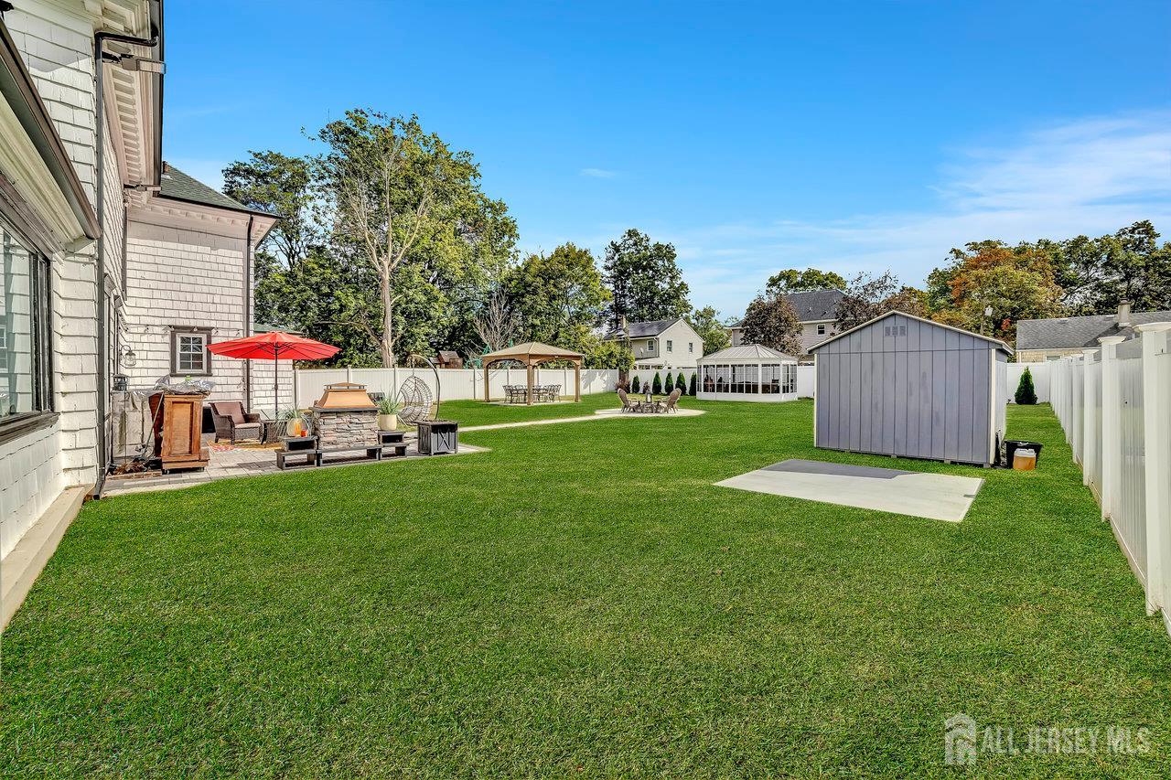 101 West Hill Road Colonia, NJ 07067 - Photo 45 of 52 a view of backyard with sitting area