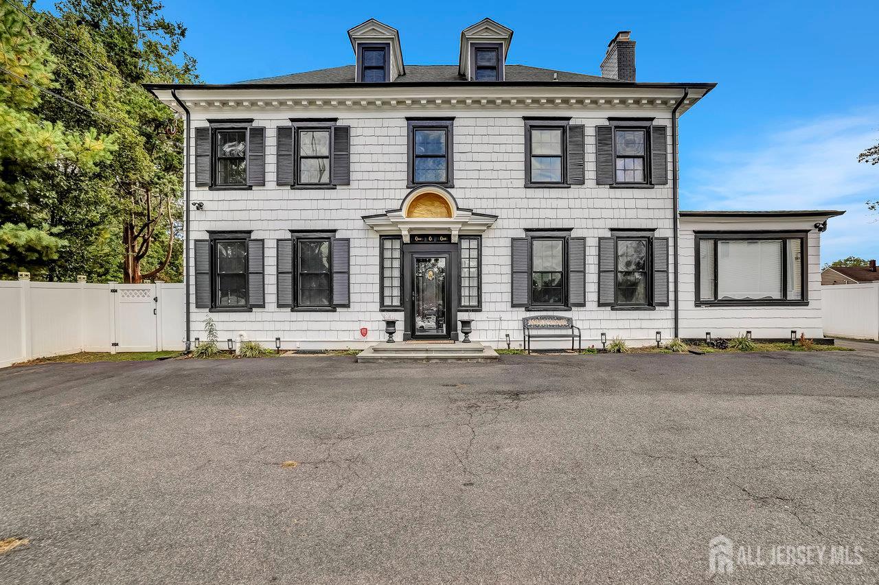 101 West Hill Road Colonia, NJ 07067 - Photo 5 of 52 front view of a house with street