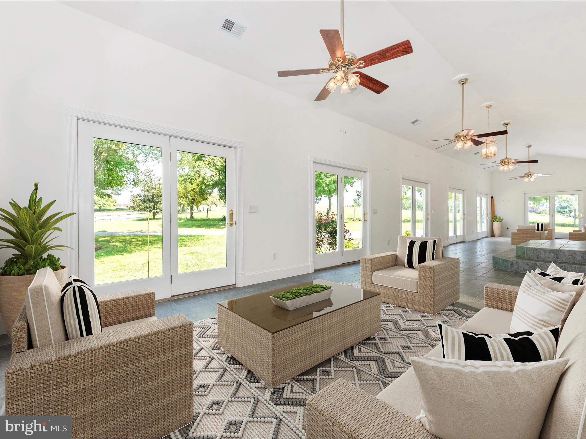 2313 Bidle Road Middletown, MD 21769 - Photo 42 of 85 a living room with furniture ceiling fan and a window