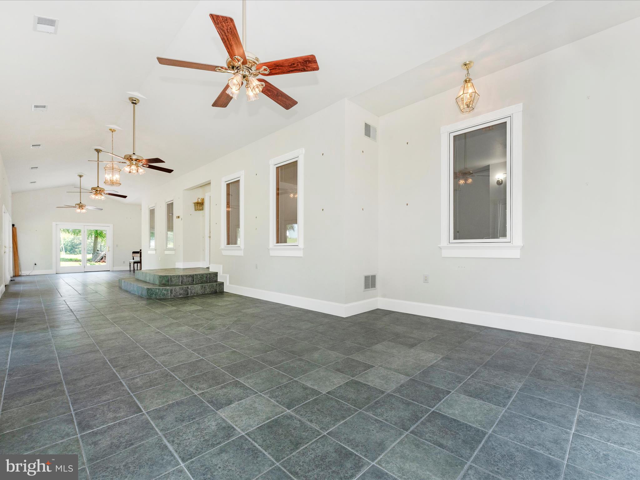 2313 Bidle Road Middletown, MD 21769 - Photo 45 of 85 a view of a livingroom with a ceiling fan and window
