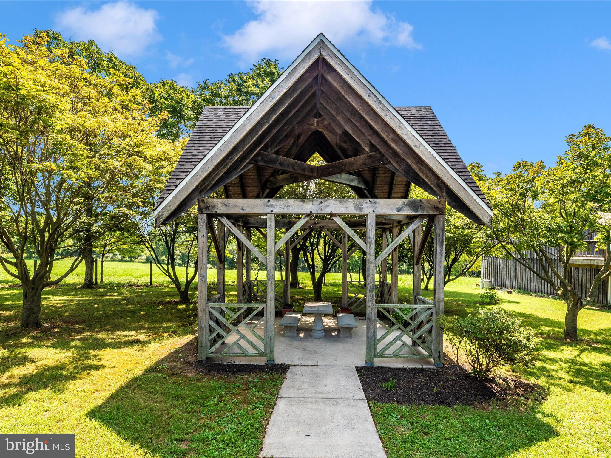 2313 Bidle Road Middletown, MD 21769 - Photo 52 of 85 a view of a house with backyard and sitting area