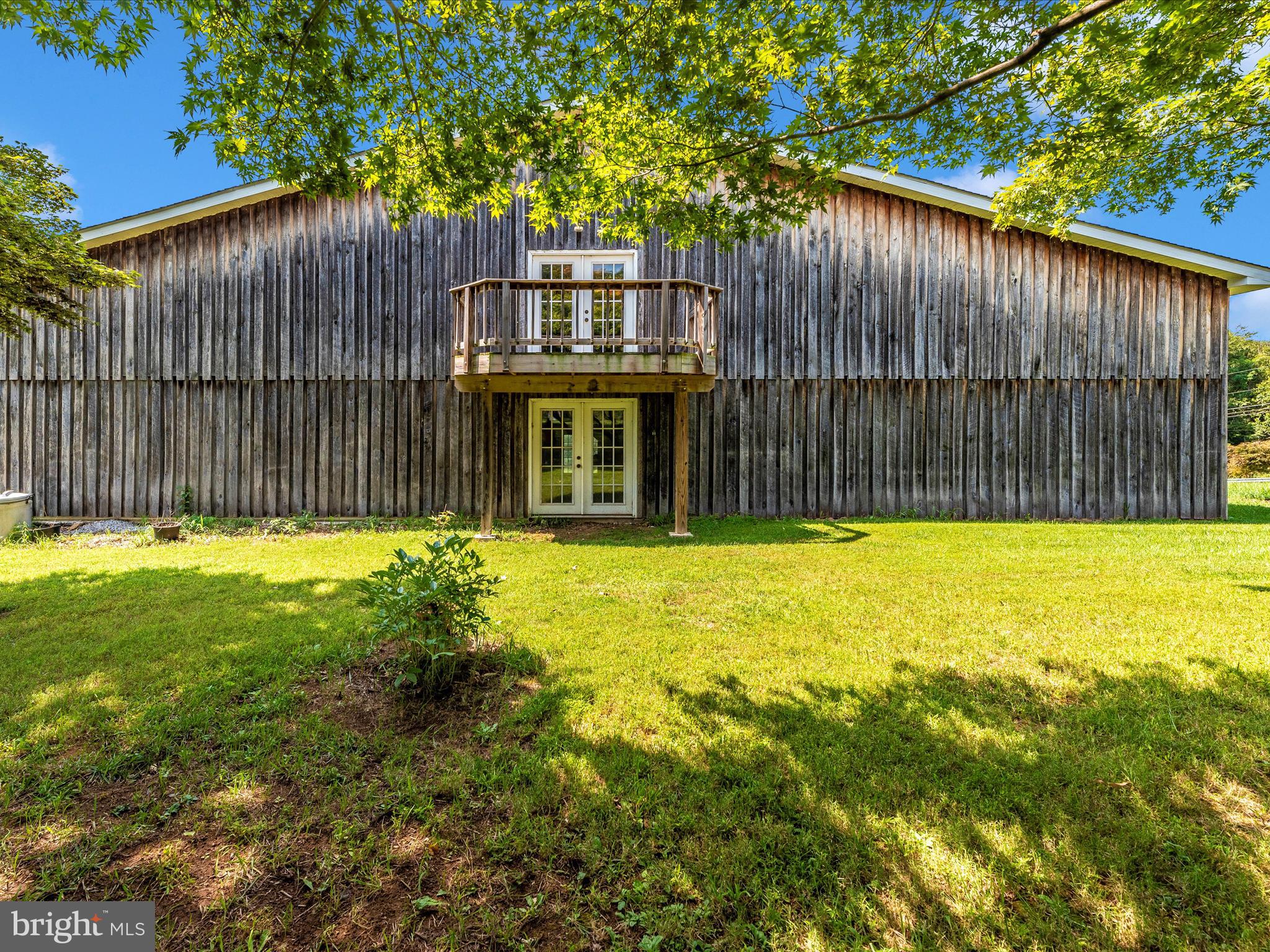 2313 Bidle Road Middletown, MD 21769 - Photo 57 of 85 a view of a house with a swimming pool
