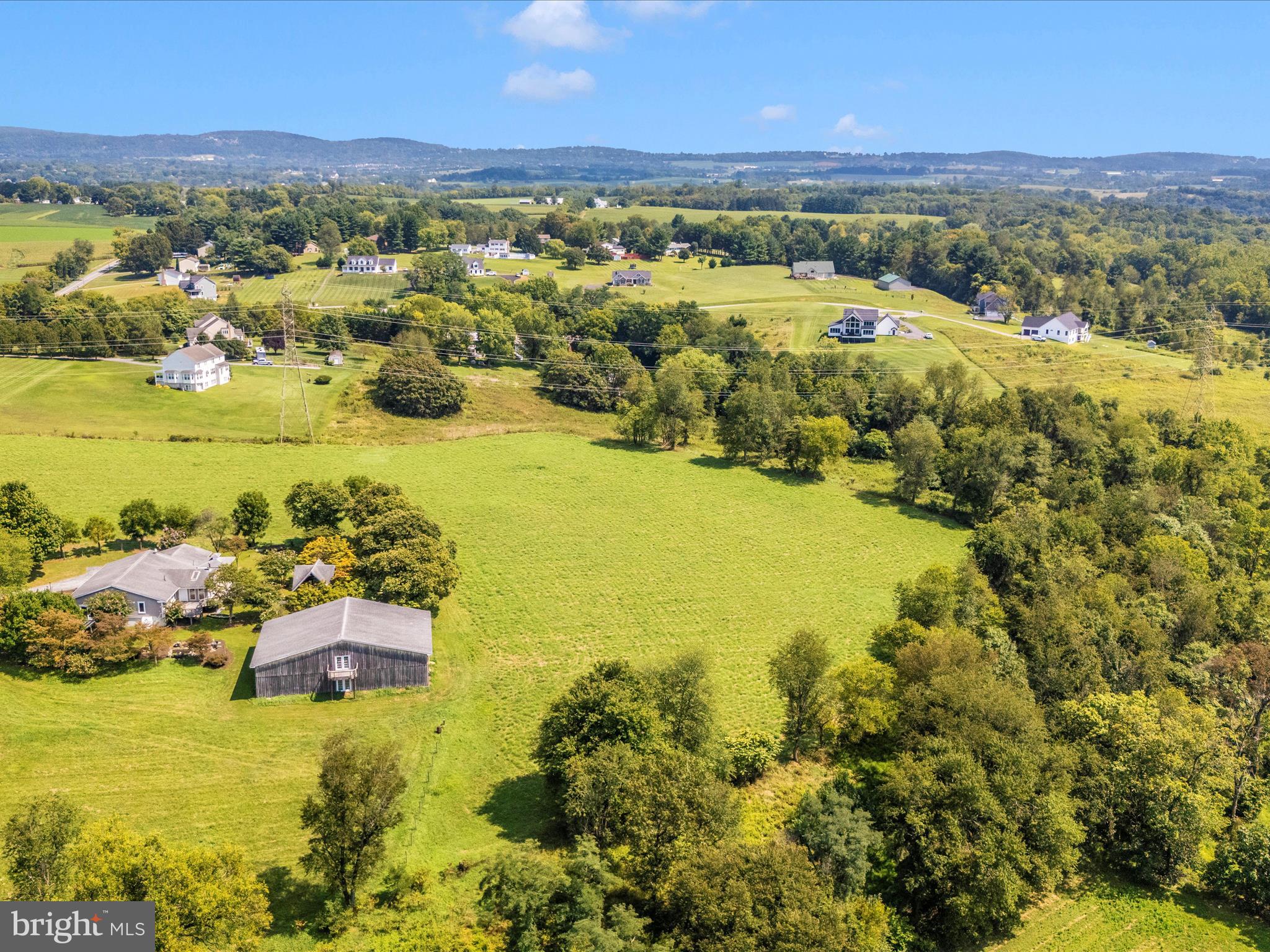 2313 Bidle Road Middletown, MD 21769 - Photo 74 of 85 a view of a city with an ocean beach