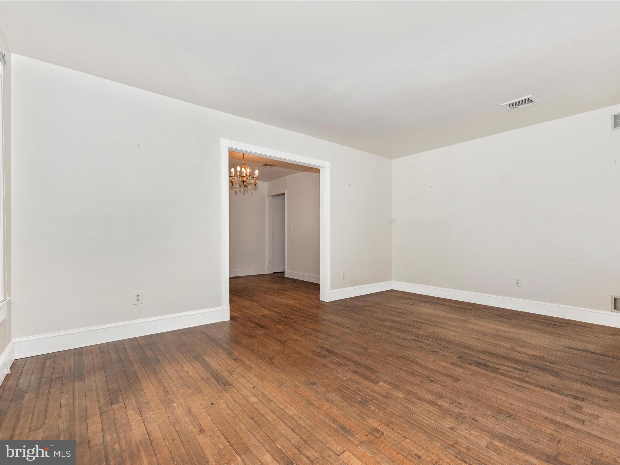 2313 Bidle Road Middletown, MD 21769 - Photo 8 of 85 a view of an empty room and wooden floor