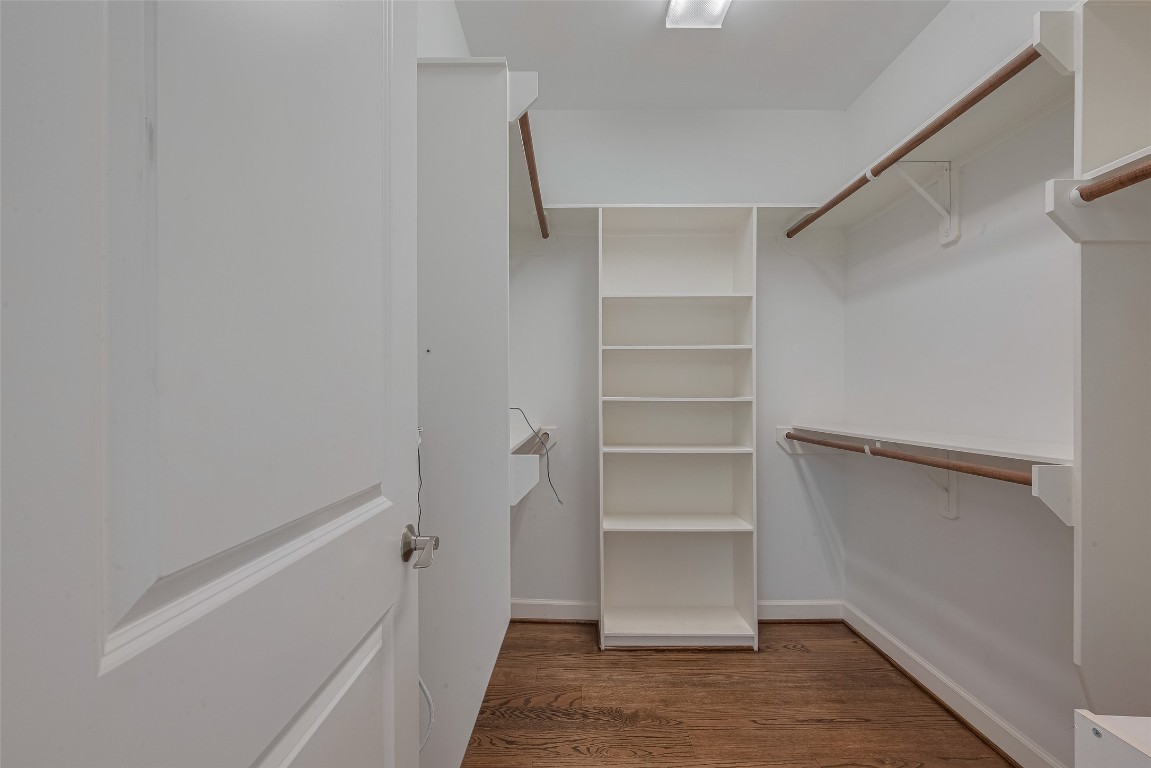 854 West 20th Street Houston, TX 77008 - Photo 38 of 40 a view of walk in closet with empty racks