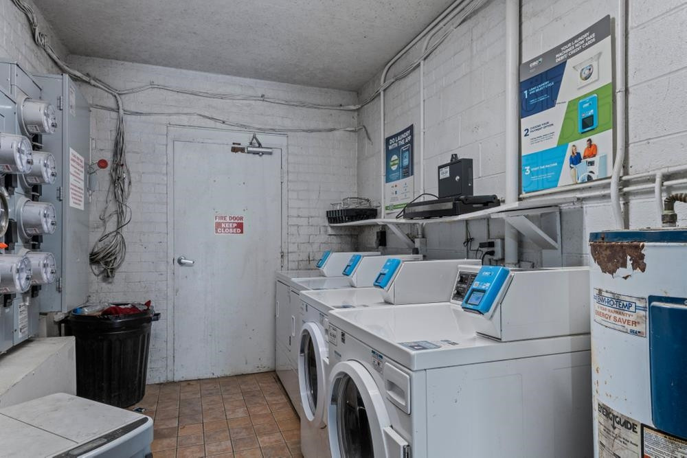 1004 Sandlin Place, Unit E Raleigh, NC 27606 - Photo 25 of 26 Condo Building Washer/ Dryer