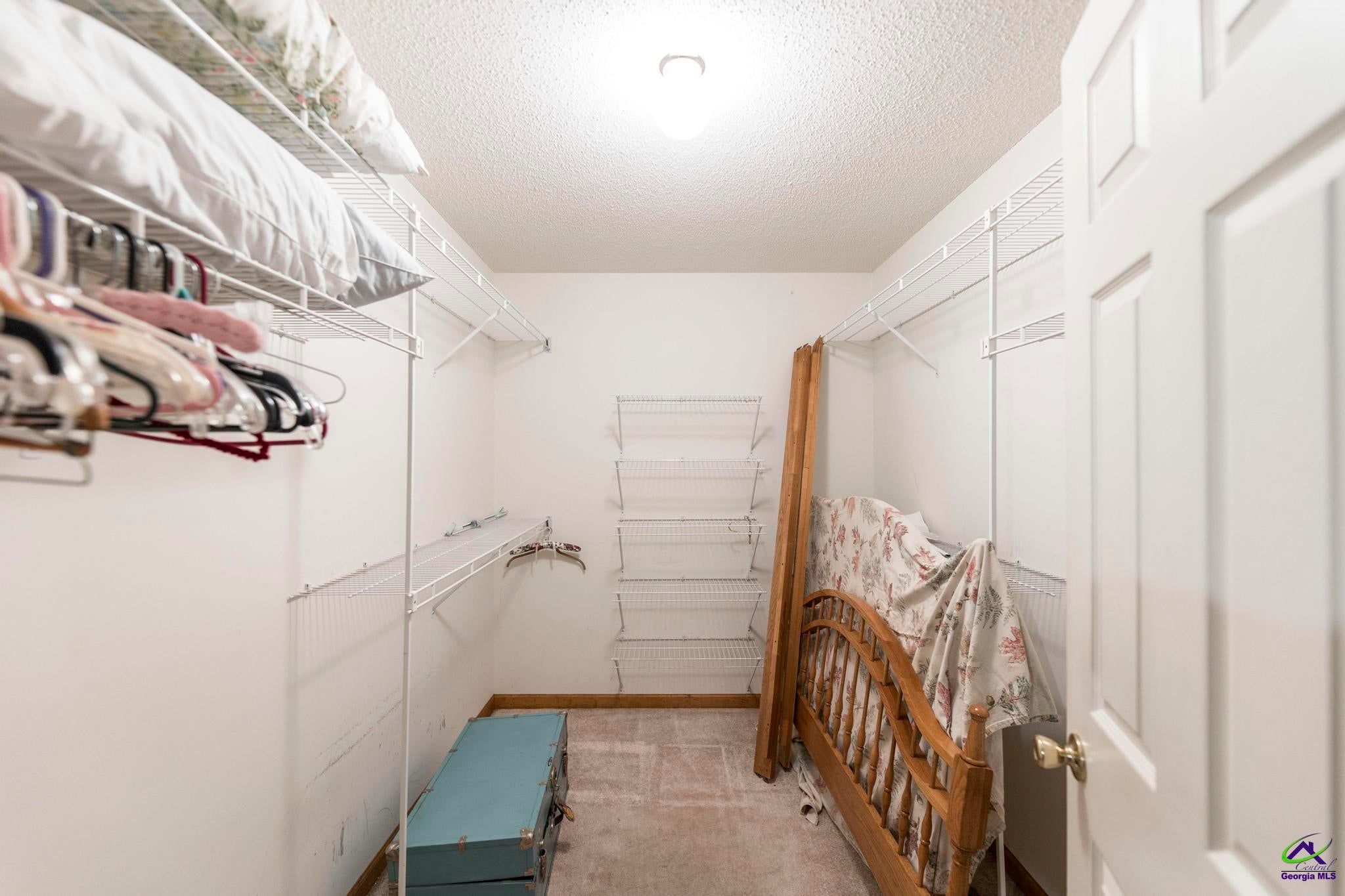 5731 School Road Macon, GA 31216 - Photo 23 of 33 Large walk-in closets with ample storage space.