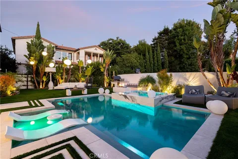 swimming pool view with seating space