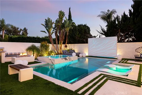 swimming pool with outdoor seating and outdoor seating