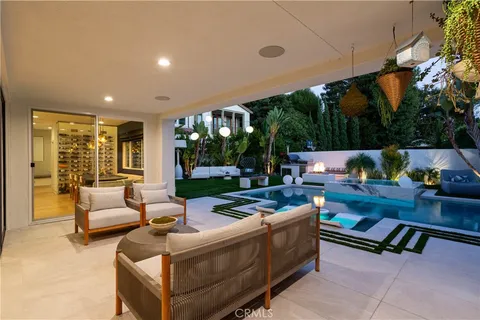 a outdoor living space with furniture and garden view