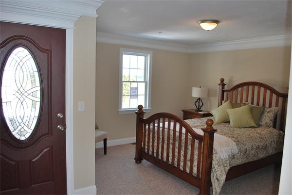 15 Littleton Road, Unit 2B Harvard, MA 01451 - Photo 11 of 29 a bedroom with a bed and window
