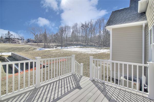 15 Littleton Road, Unit 2B Harvard, MA 01451 - Photo 3 of 29 a view of a house with a wooden fence