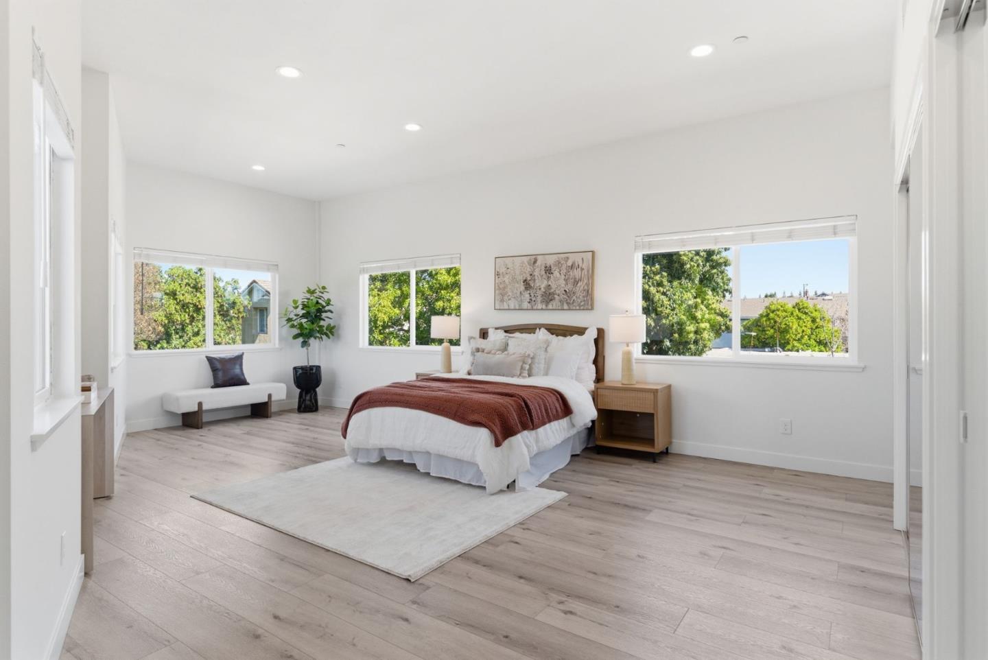 538 Dean Street Hayward, CA 94541 - Photo 13 of 25 a spacious bedroom with a large bed and a couch