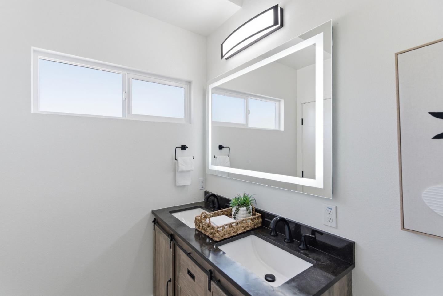 538 Dean Street Hayward, CA 94541 - Photo 17 of 25 a bathroom with a sink vanity and a mirror