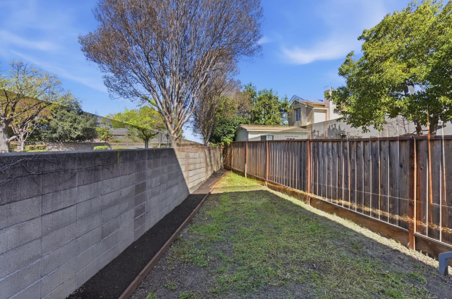 538 Dean Street Hayward, CA 94541 - Photo 24 of 25 a view of a backyard with wooden fence