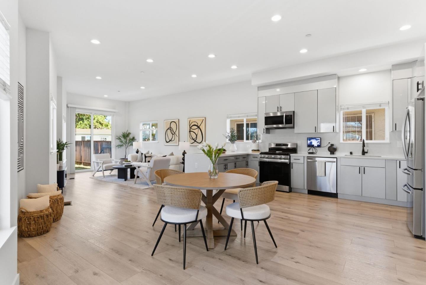 538 Dean Street Hayward, CA 94541 - Photo 4 of 25 a large kitchen with cabinets table and chairs