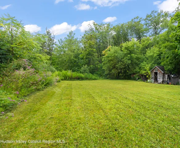 a view of outdoor space and yard