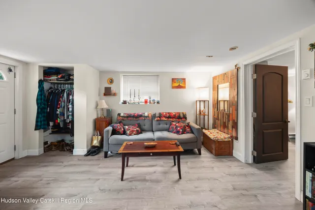 a living room with furniture and a couch