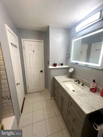 a bathroom with a bathtub