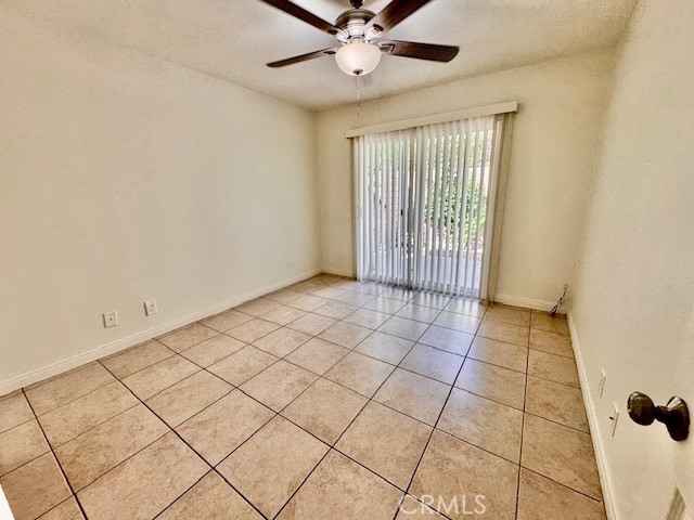 74402 Abronia, Unit 7 Palm Desert, CA 92260 - Photo 10 of 15 a view of an empty room and a window