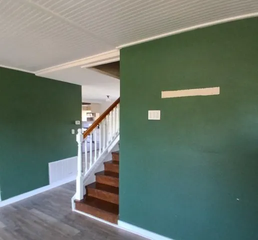 a view of a room that has a window