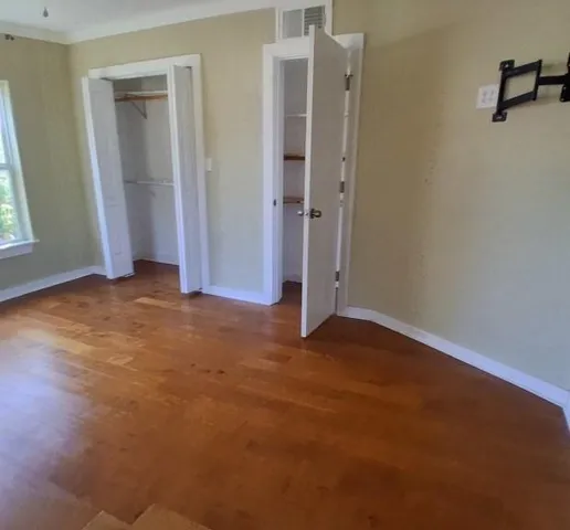 a bathroom with a toilet and a bathtub