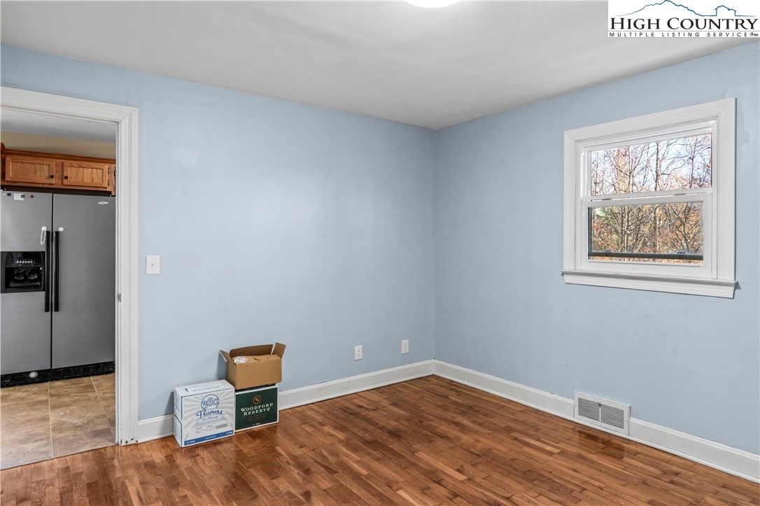 133 South Street Elkin, NC 28621 - Photo 14 of 24 a view of an empty room and wooden floor