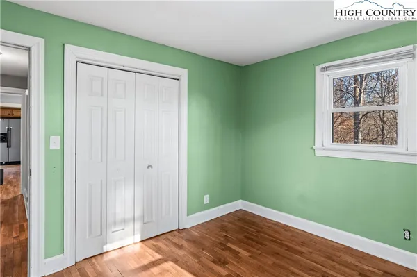 a view of a room that has a window in it