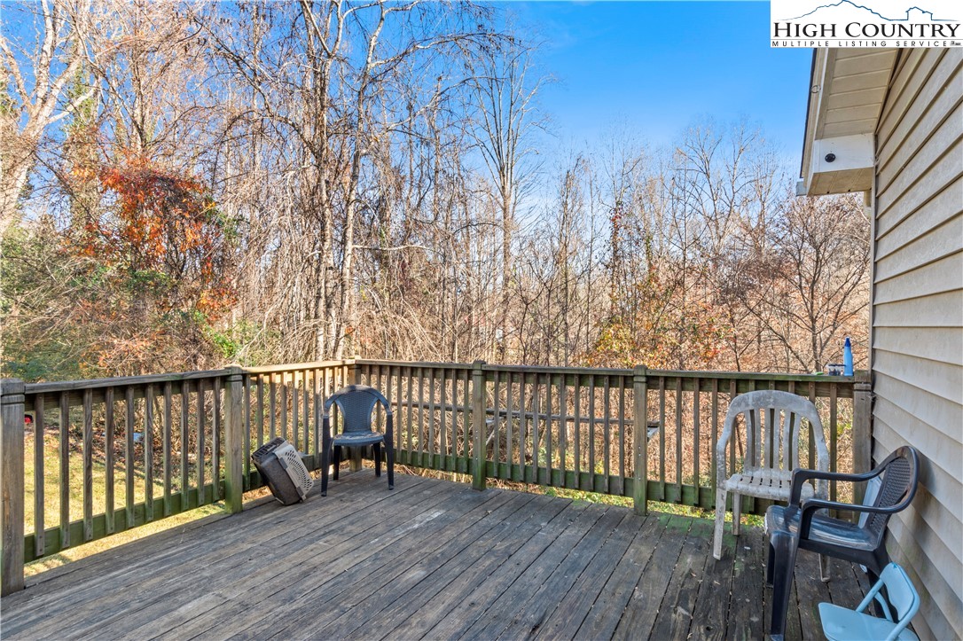 133 South Street Elkin, NC 28621 - Photo 20 of 24 a view of a balcony with wooden floor