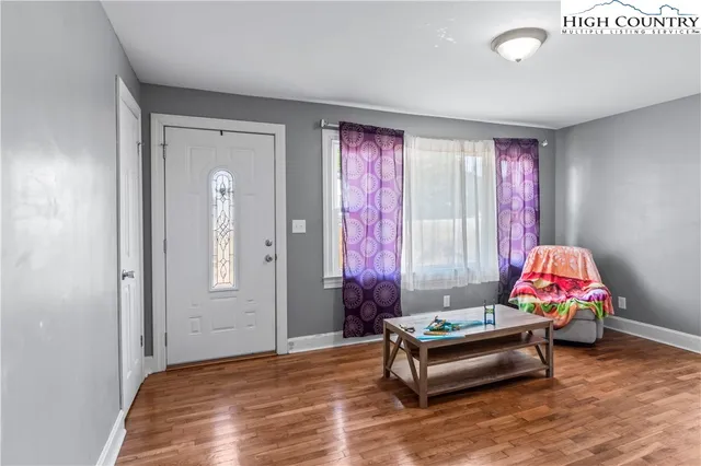 a bedroom with furniture and windows