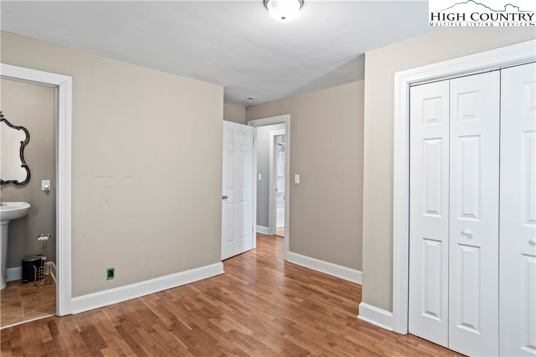 133 South Street Elkin, NC 28621 - Photo 10 of 24 wooden floor in an empty room