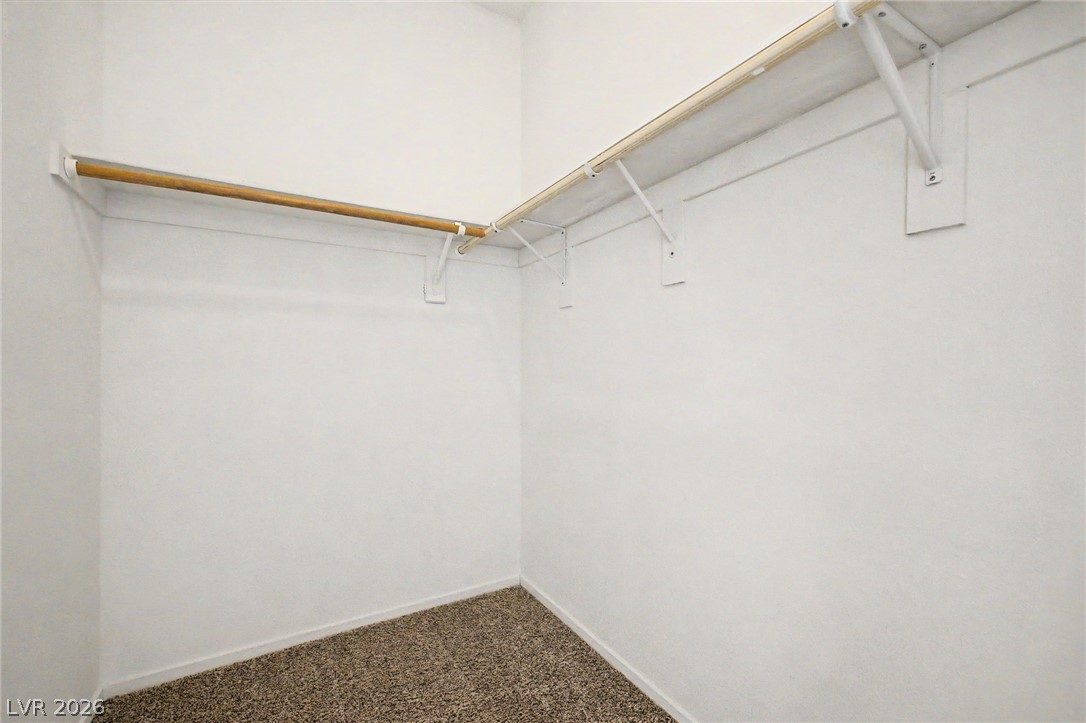 2223 Ramsgate Drive Henderson, NV 89074 - Photo 17 of 32 Functional wardrobe featuring convenient shelving and hanging space for optimal organization.
