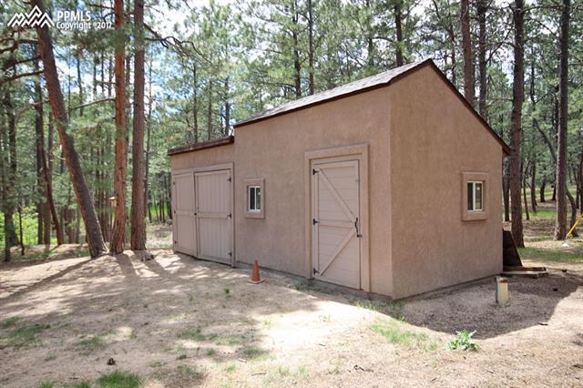 3415 Arena Road Colorado Springs, CO 80921 - Photo 29 of 36 Large storage shed to house,.... hmmm atv's,.. riding mowers,.. where will your imagination take you??