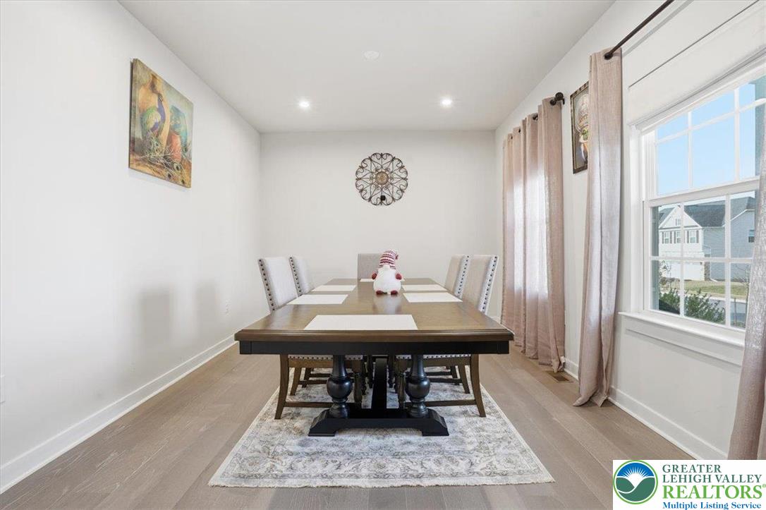 3902 Orth Street Bethlehem, PA 18020 - Photo 11 of 62 a view of a dining room with furniture and a window