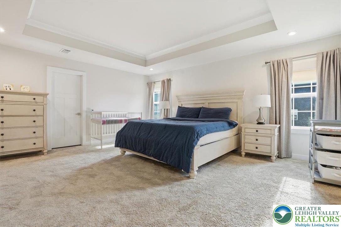 3902 Orth Street Bethlehem, PA 18020 - Photo 26 of 62 a spacious bedroom with a bed and a cabinets